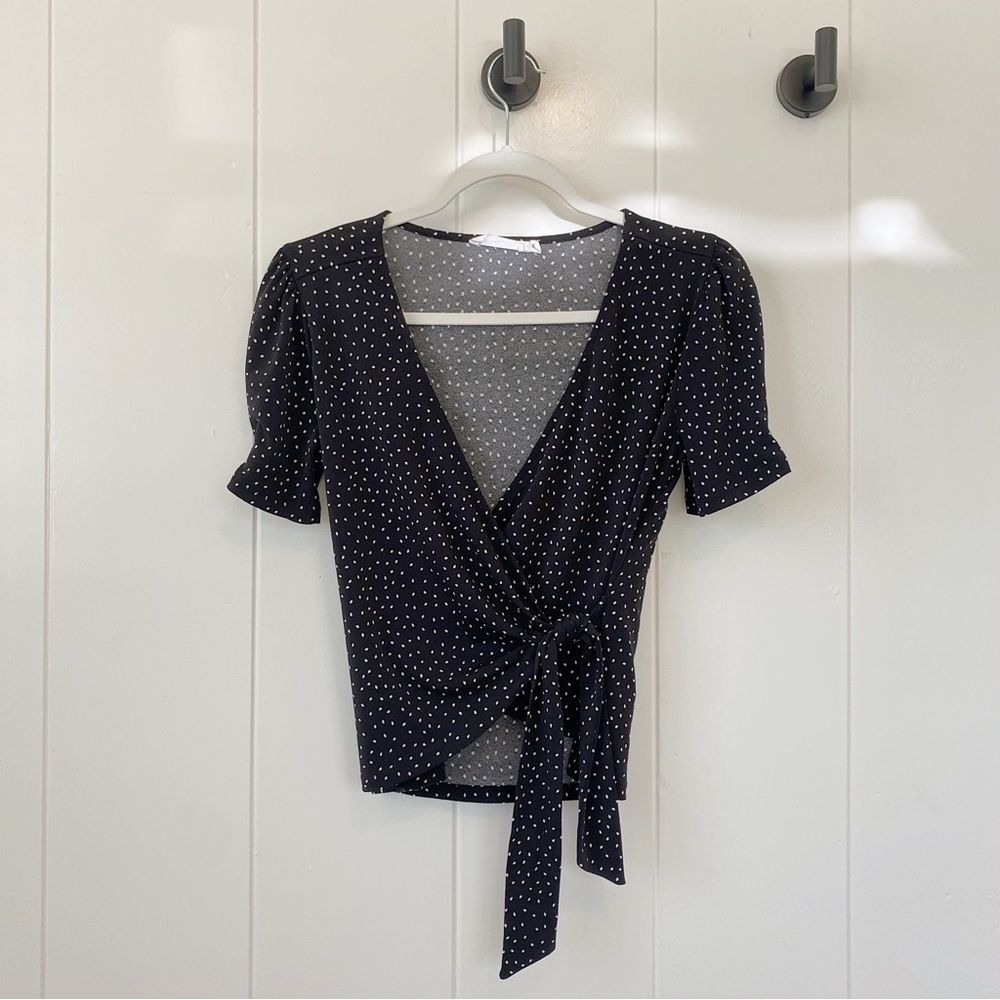 Semi-cropped polka dot wrap blouse